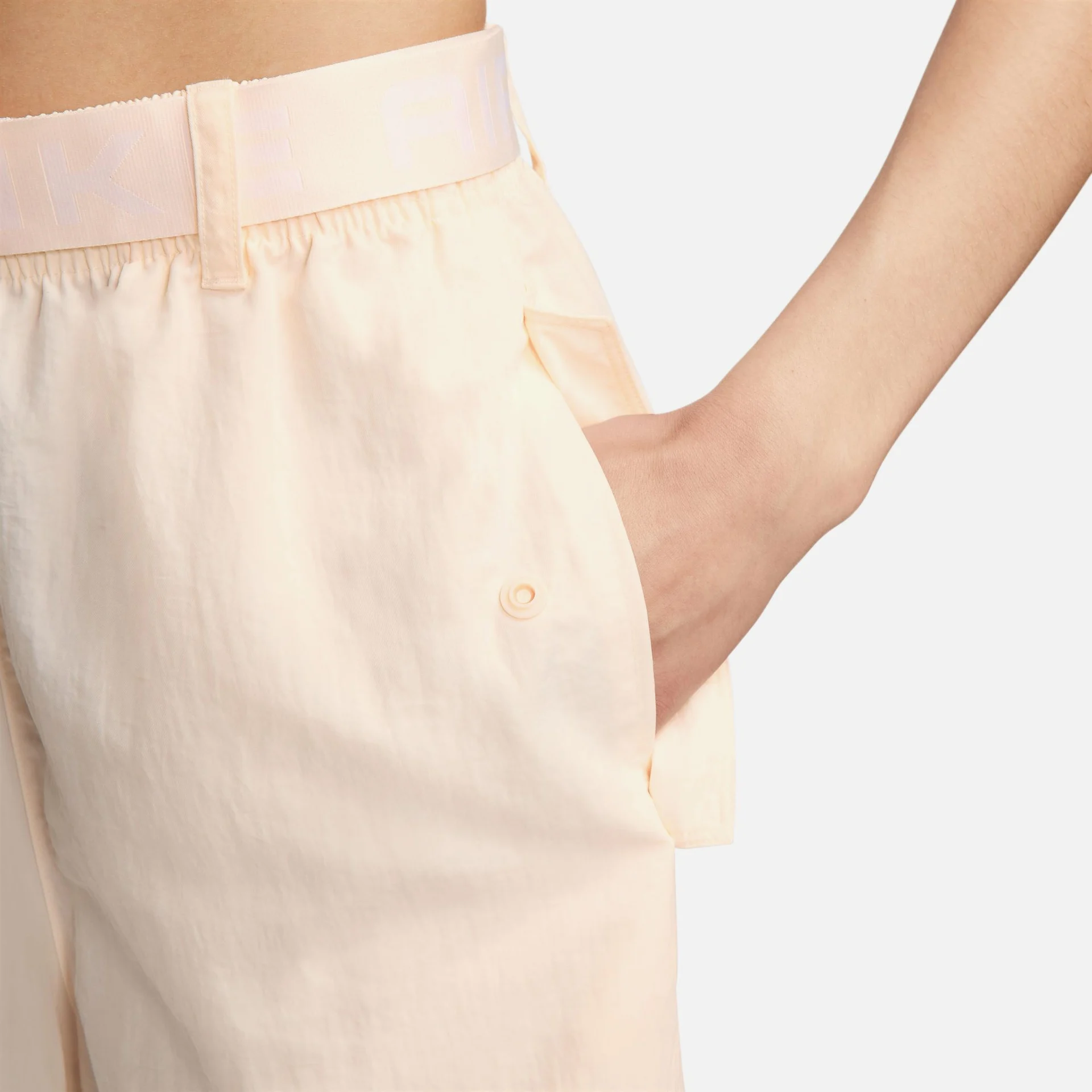 NIKE WOMENS AIR HIGH RISE WOVEN PANT - GUAVA ICE/WHITE