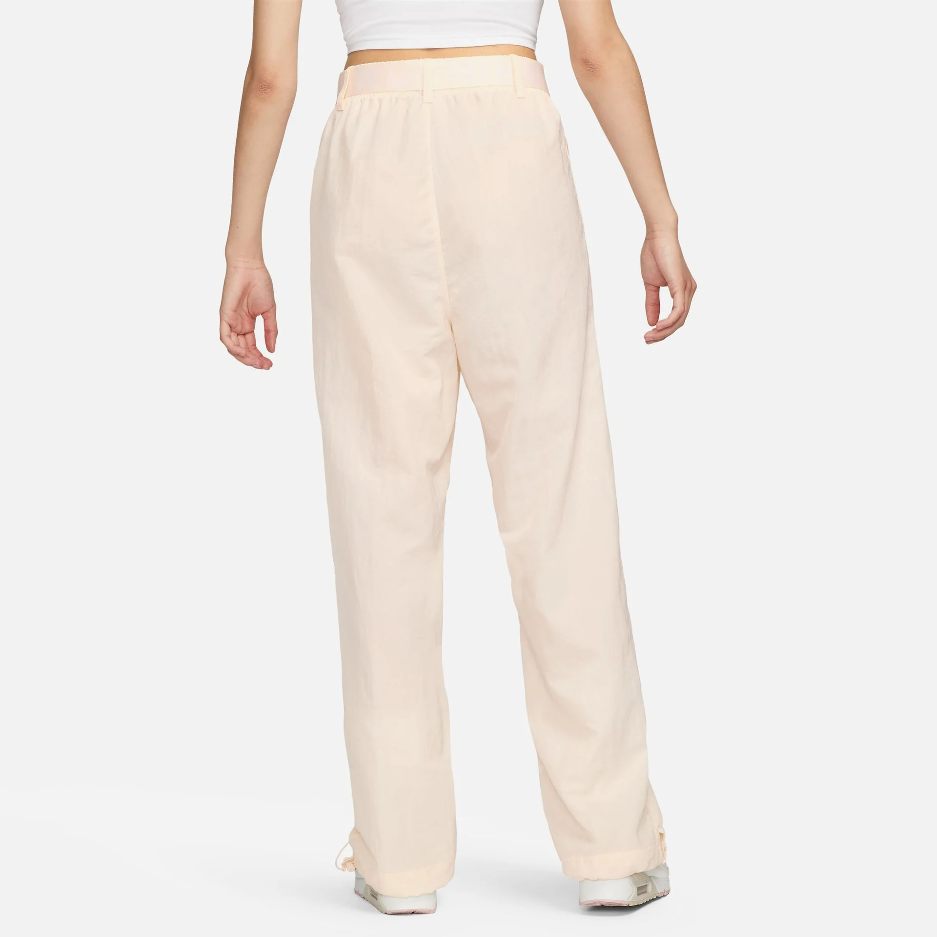 NIKE WOMENS AIR HIGH RISE WOVEN PANT - GUAVA ICE/WHITE